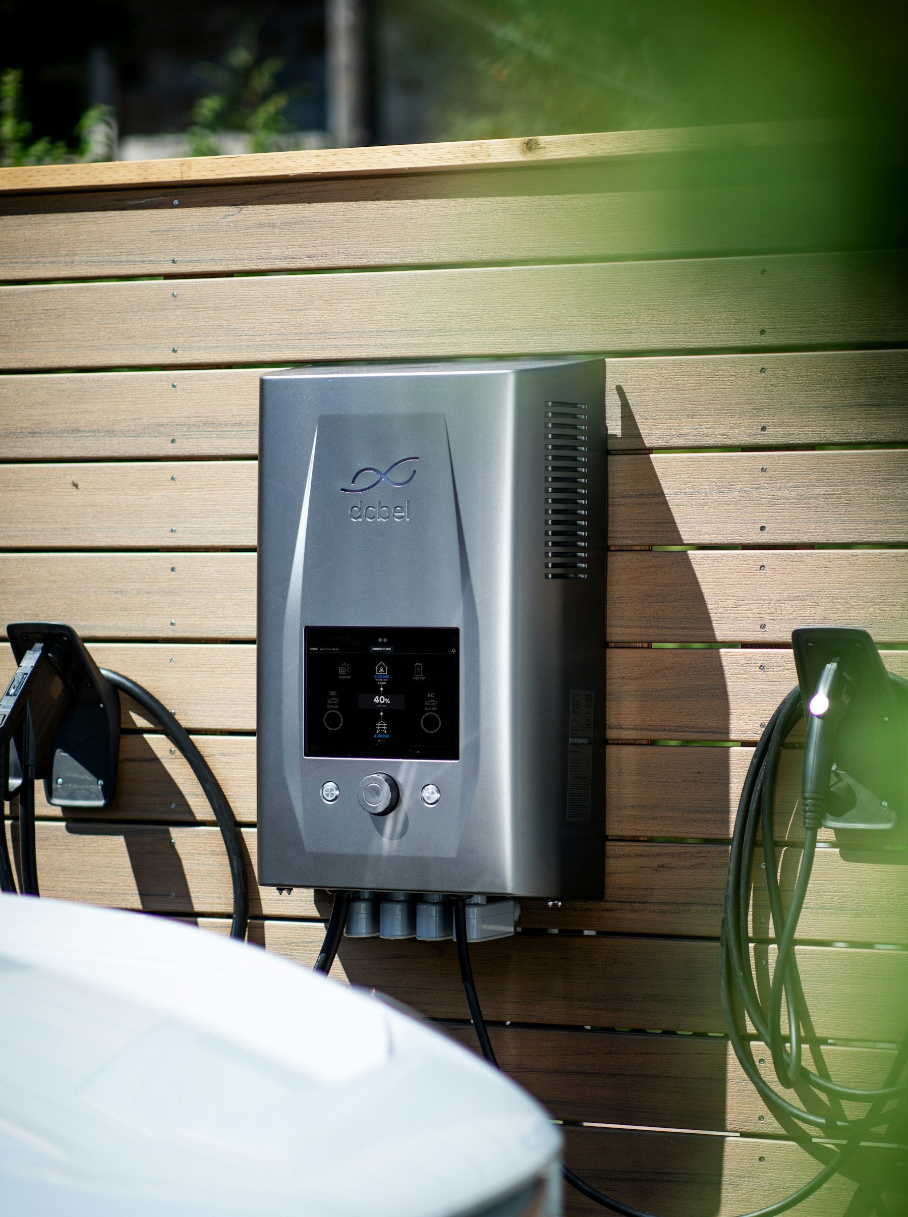 Wall-mounted home energy station with battery storage and EV charging