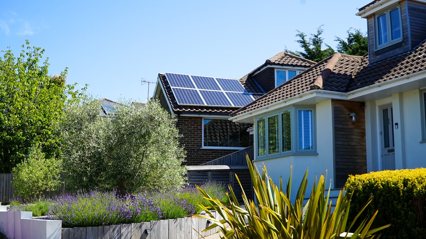 Modern home with rooftop solar panels