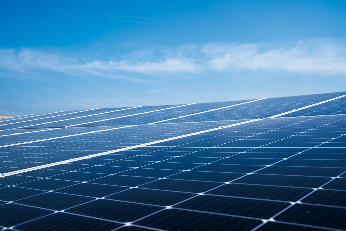 Solar panels on a residential roof generating DC power