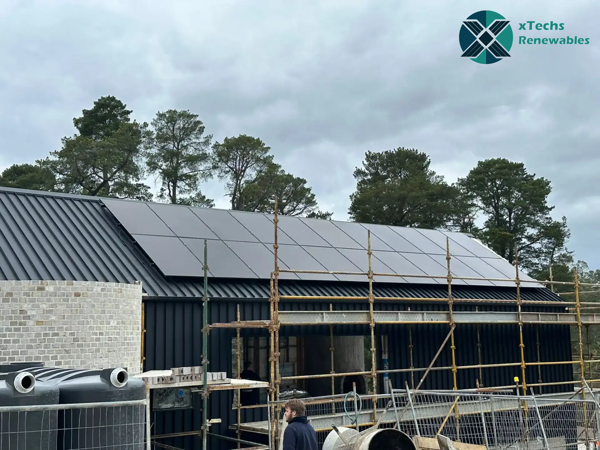 Construction site with solar panel installation in progress